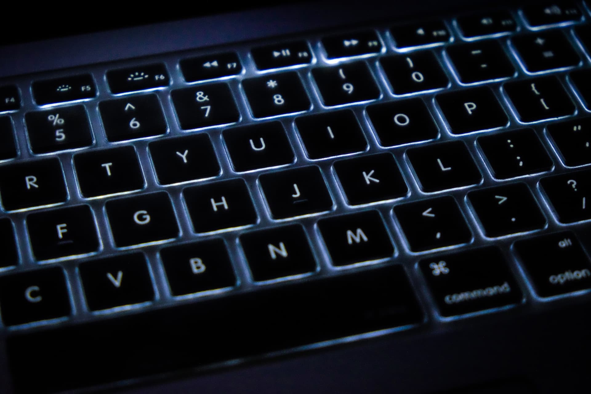 lit up MacBook Pro keyboard