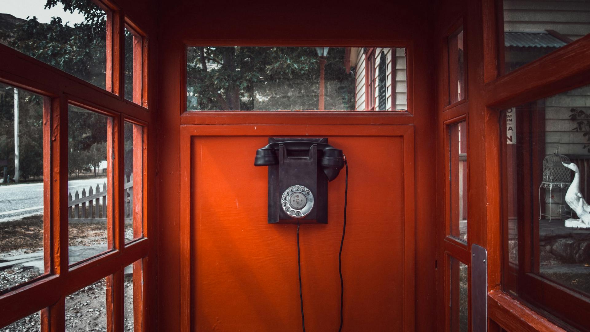payphone in a red booth